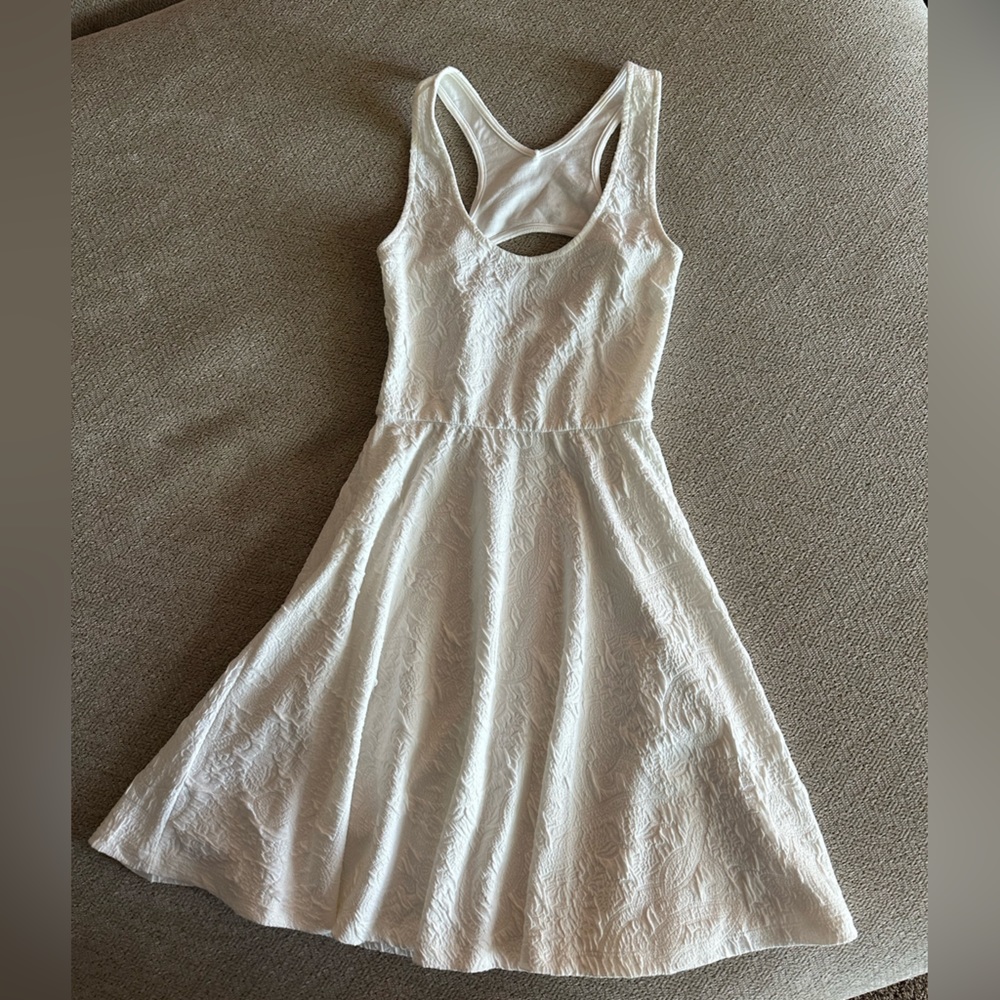 White racer back mini dress. Size Small. Boutique dress, nice material.